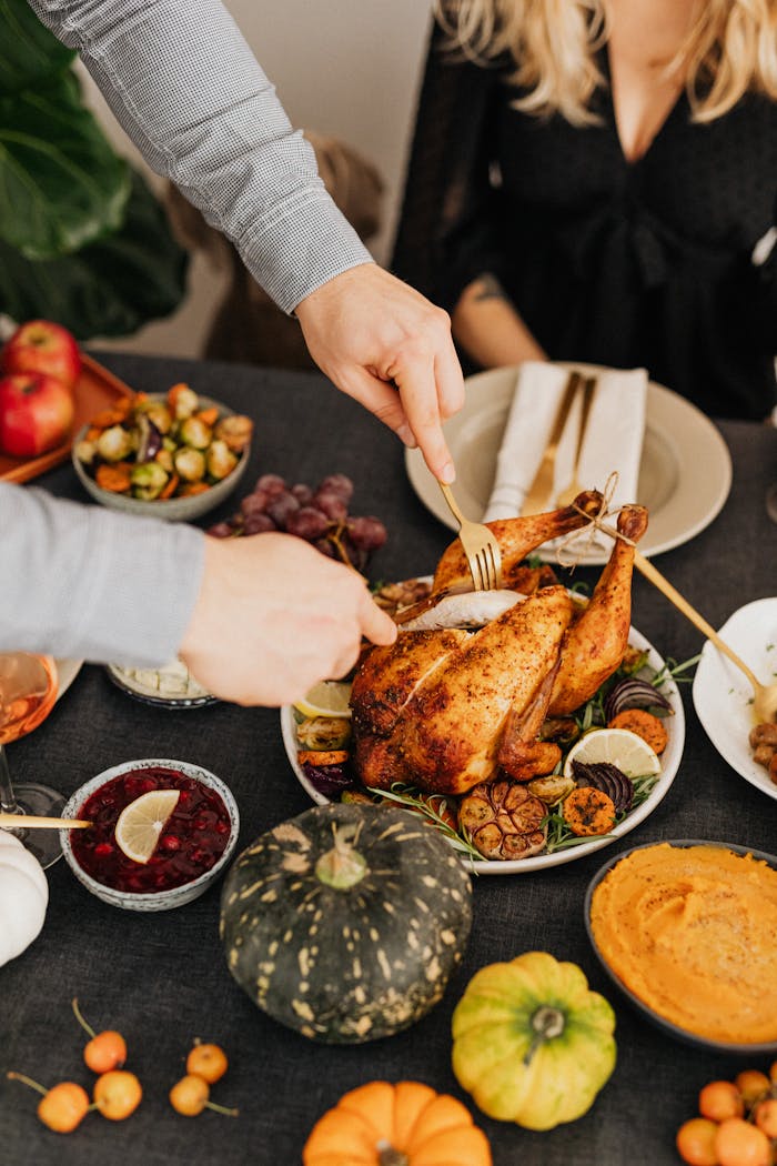 Enjoy a cozy thanksgiving meal with roasted turkey and seasonal sides. Perfect for festive gatherings.